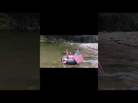 Short YouTube clip — playful cartoon-style character cooling off in a shallow river, comic and family-friendly. Rock River, Vermont context; hosted on YouTube.